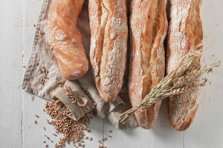 rustic-baguettes-baked-in-bakery-country-kitchen-FLZTJXD.jpg
